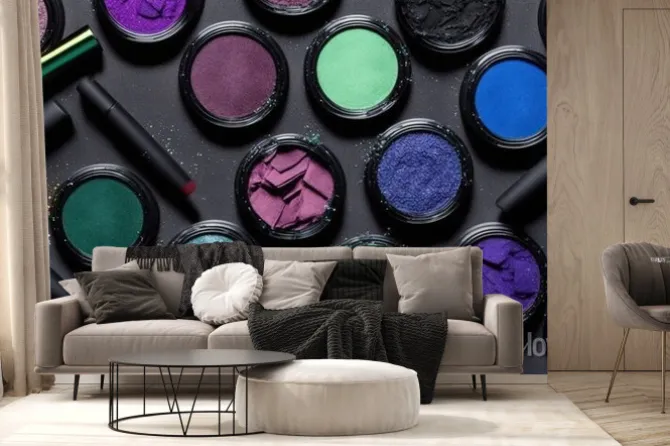 Fototapeta: A collection of colorful eyeshades and brushes on a table with