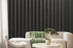 Fototapeta: A wooden lamella wall in the color of burnt wood with a pattern