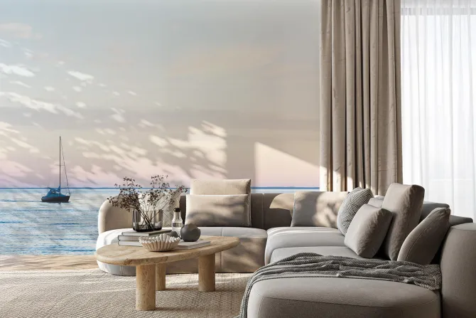 Fototapeta: Żaglówka pływająca na morzu przy zachodzie słońca