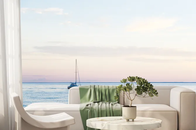 Fototapeta: Żaglówka pływająca na morzu przy zachodzie słońca