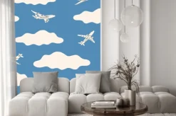 Fototapeta: Aircraft flying above the clouds. silhouettes of white passenger