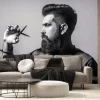 Fototapeta: Bearded man isolated on gray background. mans haircut in barber