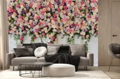 Fototapeta: Beautiful decorative colorful roses on brick wall. wedding party