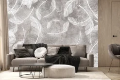 Fototapeta: Białe pióra na szarym betonowym tle styl loft