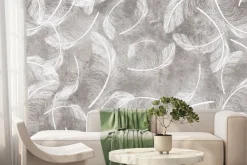 Fototapeta: Białe pióra na szarym betonowym tle styl loft