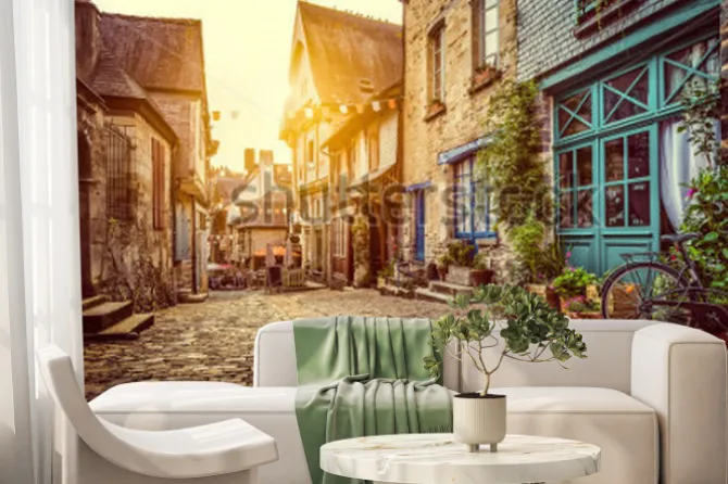 Fototapeta: Brukowana uliczka o zachodzie słońca