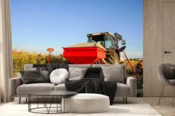 Fototapeta: Ciągnik z siewnikiem na polu