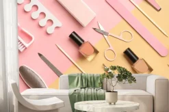 Fototapeta: Composition with cosmetics and accessories for manicure or pedicure.