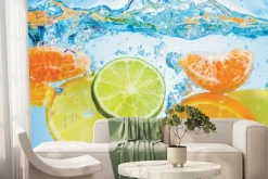 Fototapeta: Cytryny i pomarańcze wpadające do wody
