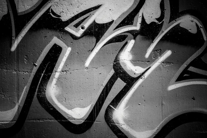 Fototapeta: Czarno-białe graffiti na betonowym murze