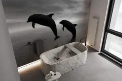 Fototapeta: Czarno-białe zdjęcie delfinów na tle wody