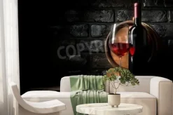 Fototapeta: Czerwone wino na tle starych czarnych cegieł