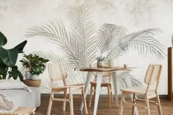 Fototapeta: Delikatne liście palmowe na betonowym tle