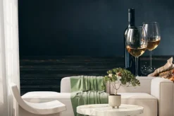 Fototapeta: Dinner concept for two. two glasses of white wine, baked fish.