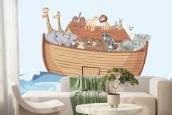 Fototapeta: Łódka pełna zwierząt bujająca na falach