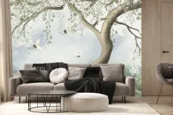 Fototapeta: Drzewo wiśni na łące z bocianami