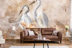 Fototapeta: Dwie białe czaple wśród kwiatów na beżowym tle