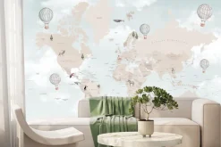 Fototapeta: Dziecięca mapa świata na tle nieba z chmurami