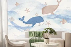 Fototapeta: Dziecięcy wzór z wielorybami i rybkami w morskiej scenerii akwarela