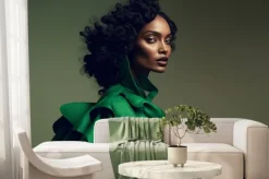 Fototapeta: Fashion portrait. black woman wearing green high fashion clothing.