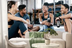 Fototapeta: Fitness, conversation and friends at the gym for training, exercise