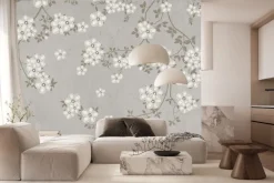 Fototapeta: Gałęzie z białymi kwiatami na betonie