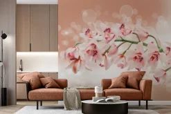 Fototapeta: Gałązka z kwiatami storczyka wśród bąbelków