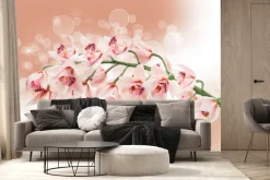 Fototapeta: Gałązka z kwiatami storczyka wśród bąbelków