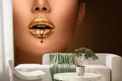 Fototapeta: Golden lipstick closeup. liquid metal dripping from gold lips.