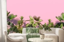 Fototapeta: Green palm trees and tropical exotic plants on a pink background