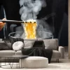 Fototapeta: Hand uses chopsticks to pickup tasty noodles with steam and smoke
