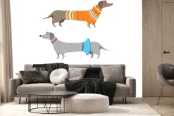 Fototapeta: Jamniki w ubraniach na białym tle