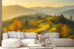 Fototapeta: Jesienny krajobraz z górami o wschodzie słońca