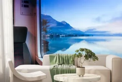 Fototapeta: Jezioro w szwajcarii widok przez okno pociągu