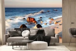 Fototapeta: Kamienie na plaży o zachodzie słońca