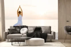 Fototapeta: Kaukaski kobieta uprawiania jogi na brzegu morza