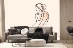 Fototapeta: Kobieta siedząca z powrotem