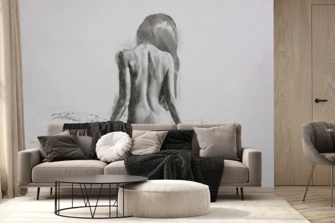 Fototapeta: Kobieta siedząca na łóżku w szarości