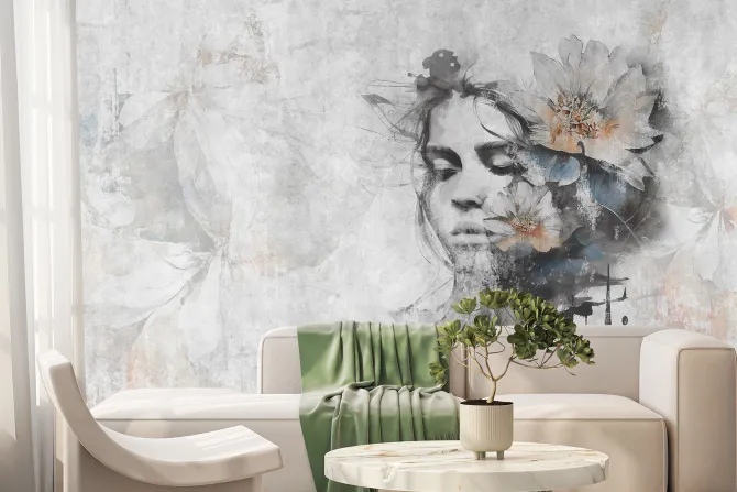 Fototapeta: Kobieta z kwiatem na głowie na szarej ścianie