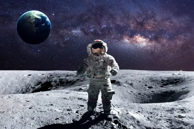 Fototapeta: Kosmonauta na księżycu na tle ziemi