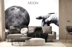 Fototapeta: Kosmonauta wskazujący na księżyc