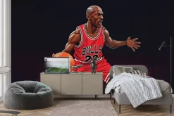 Fototapeta: Koszykarz biegnący z piłką na boisku