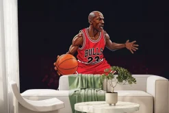 Fototapeta: Koszykarz biegnący z piłką na boisku