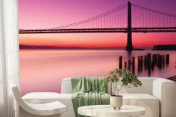 Fototapeta: Krajobraz z zachodem słońca i mostem na tle różowego nieba