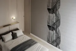 Fototapeta: Kręcone schody na białej ceglanej ścianie