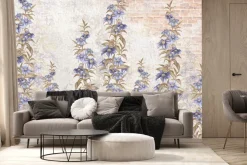 Fototapeta: Kwiaty w odcieniach niebieskiego na ceglanej ścianie