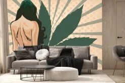 Fototapeta: Lady with cannabis leaf. the marijuana leafs on the background.