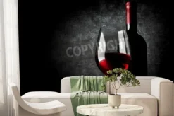 Fototapeta: Lampka czerwonego wina na czarnym tle