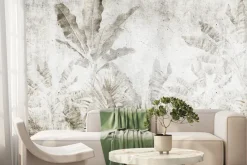 Fototapeta: Liście bananowca na betonowej ścianie w stylu urban jungle