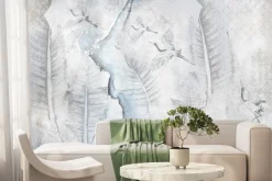 Fototapeta: Liście i żurawie na betonowej ścianie